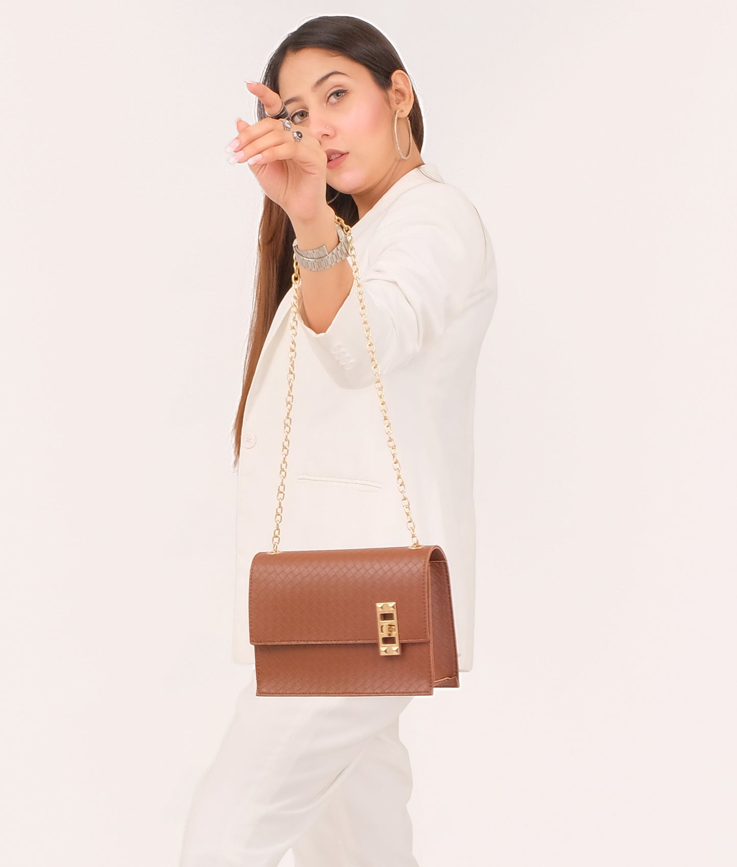 Brown weaved chain shoulder bag with twist lock